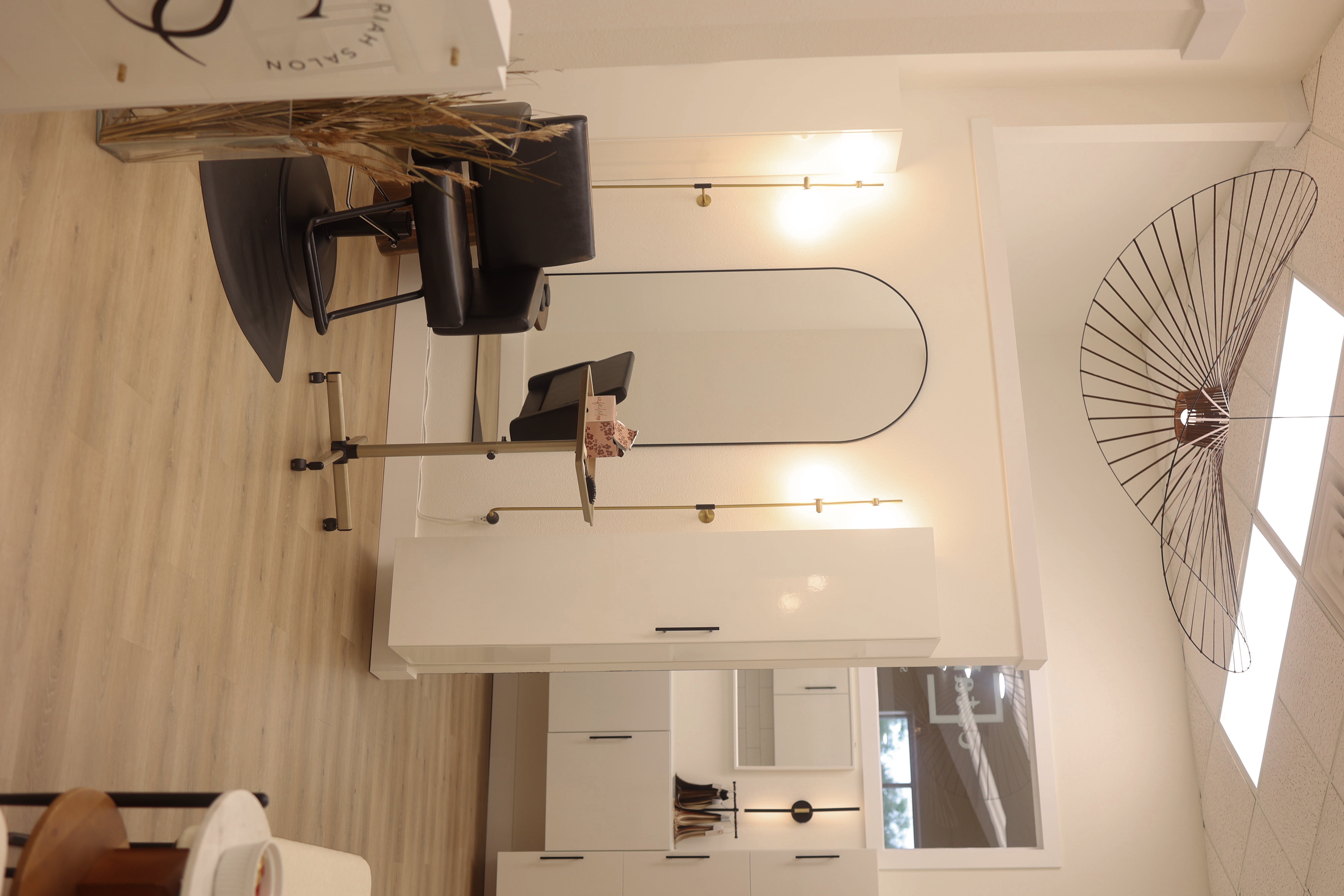 The Riah Salon interior with styling chairs and arched mirrors